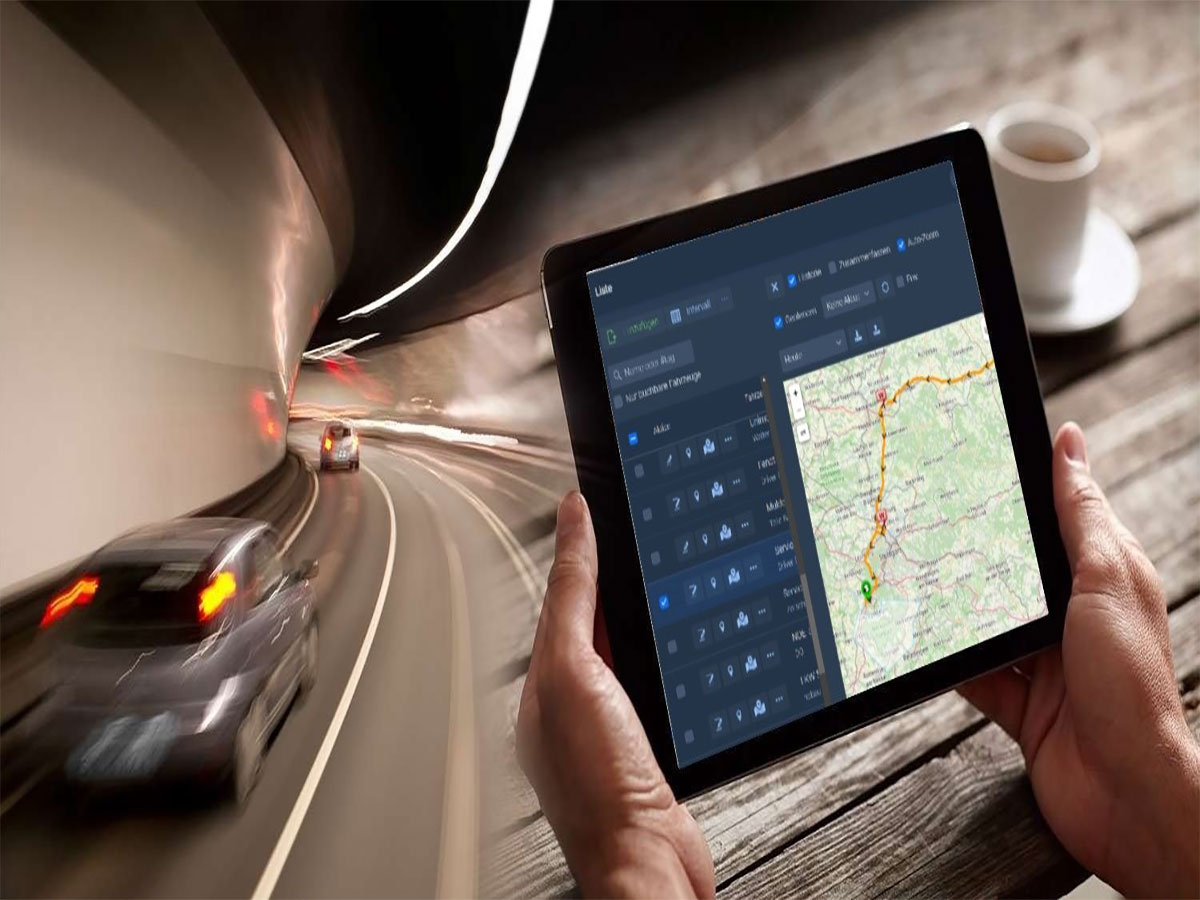 man holding tablet tracking a delivery through a tunnel