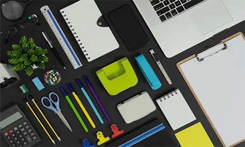 office supplies and equipment office supplies and laptop on a black background